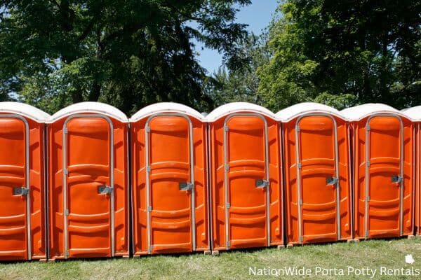 a lineup of clean and well-maintained portable loos for workers in Arizona