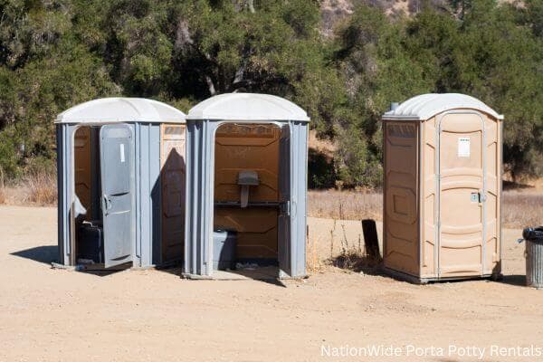 a clean row of portable restrooms for outdoor weddings or festivals in Sonoita, AZ